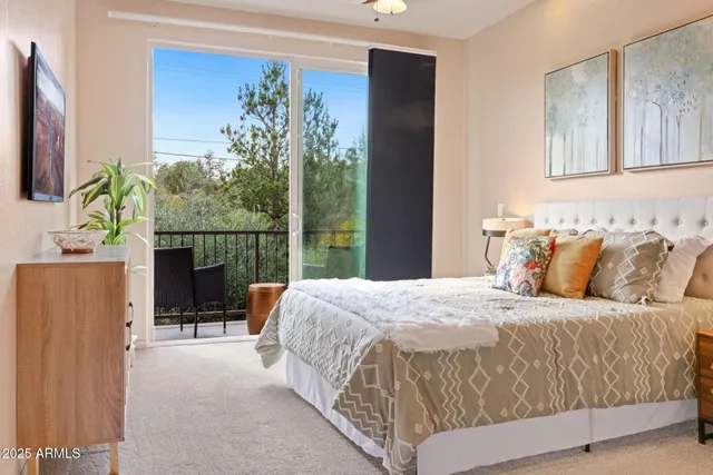 a bathroom with a granite countertop sink mirror and shower