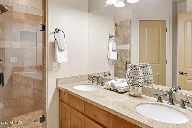 a view of a chair and tables on the balcony