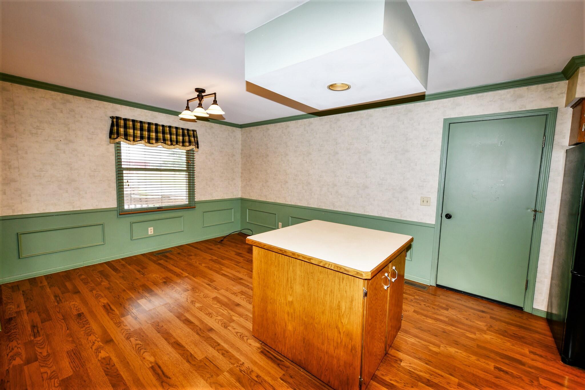 15743 Hagenderfer Road Plain City, OH 43064 - Photo 20 of 49 Center Island and Door to Att. Garage
