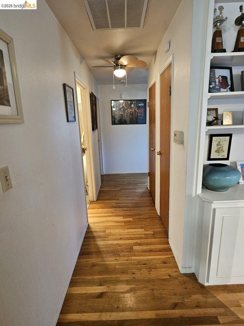19967 Peaceful Oak Road Sonora, CA 95370 - Photo 12 of 35 Hallway with wood-type flooring