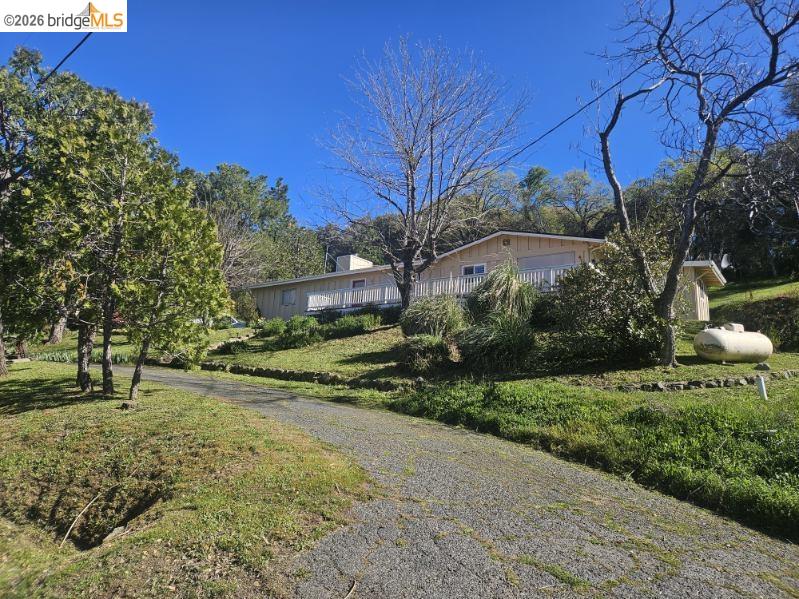 19967 Peaceful Oak Road Sonora, CA 95370 - Photo 2 of 35 View of front of property featuring a front yard
