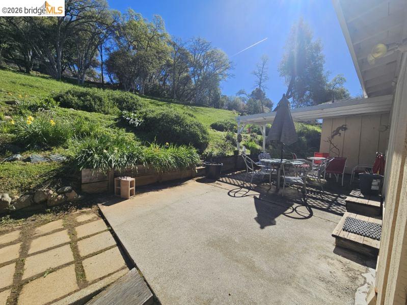 19967 Peaceful Oak Road Sonora, CA 95370 - Photo 22 of 35 View of patio with outdoor dining area