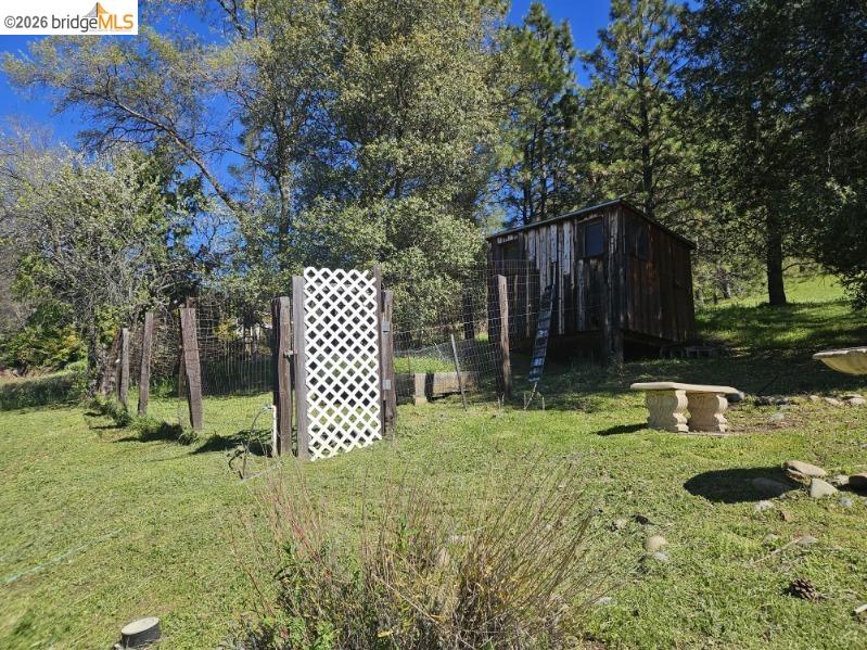 19967 Peaceful Oak Road Sonora, CA 95370 - Photo 30 of 35 View of yard with an outbuilding