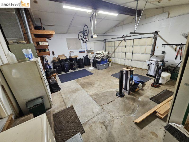 19967 Peaceful Oak Road Sonora, CA 95370 - Photo 33 of 35 Garage featuring freestanding refrigerator