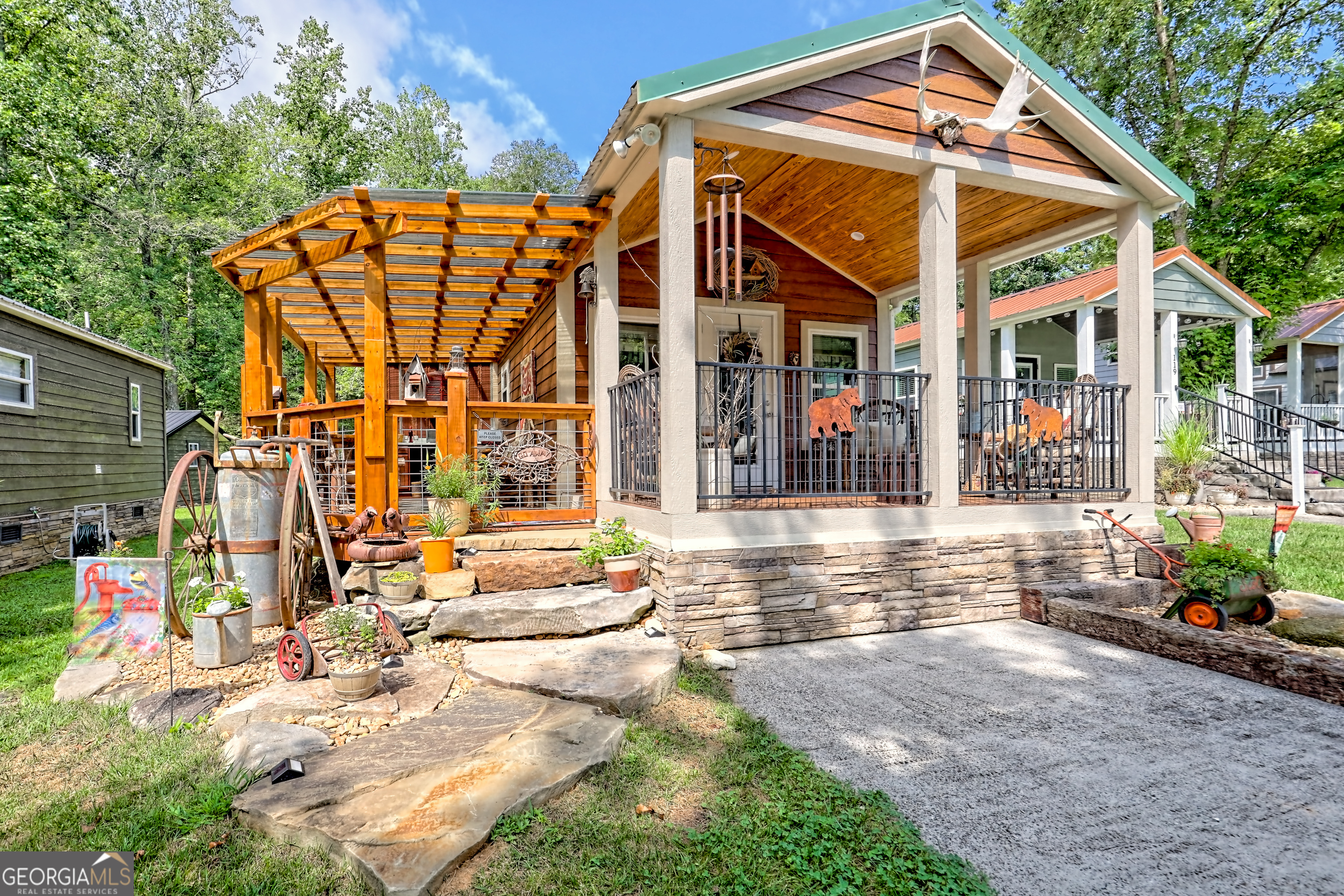 4960 Laurel Lodge Road, Unit 18 Clarkesville, GA 30523 - Photo 2 of 59 a view of a house with a patio