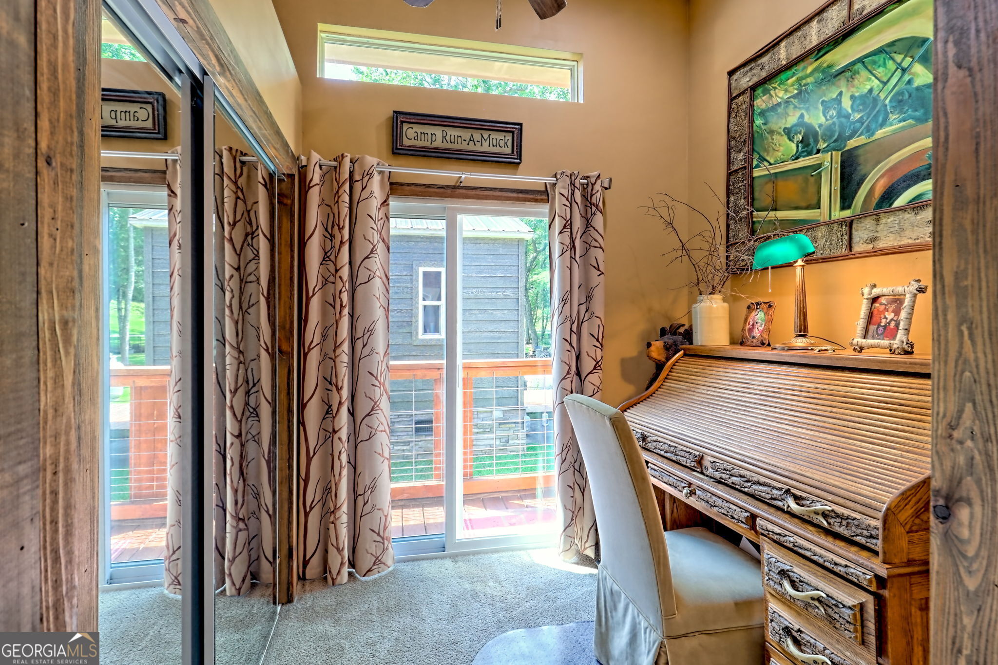 4960 Laurel Lodge Road, Unit 18 Clarkesville, GA 30523 - Photo 25 of 59 a view of a balcony with furniture and front door