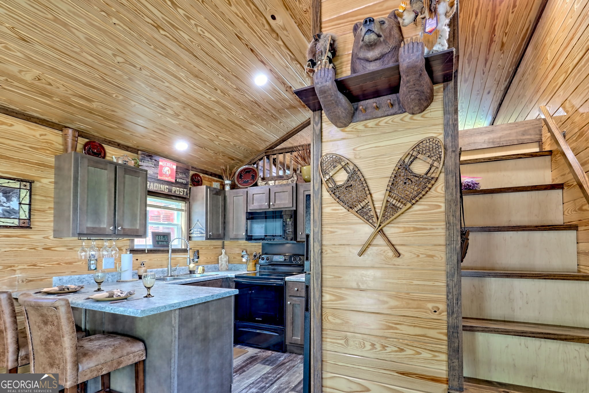 4960 Laurel Lodge Road, Unit 18 Clarkesville, GA 30523 - Photo 30 of 59 a bathroom with a sink and mirror