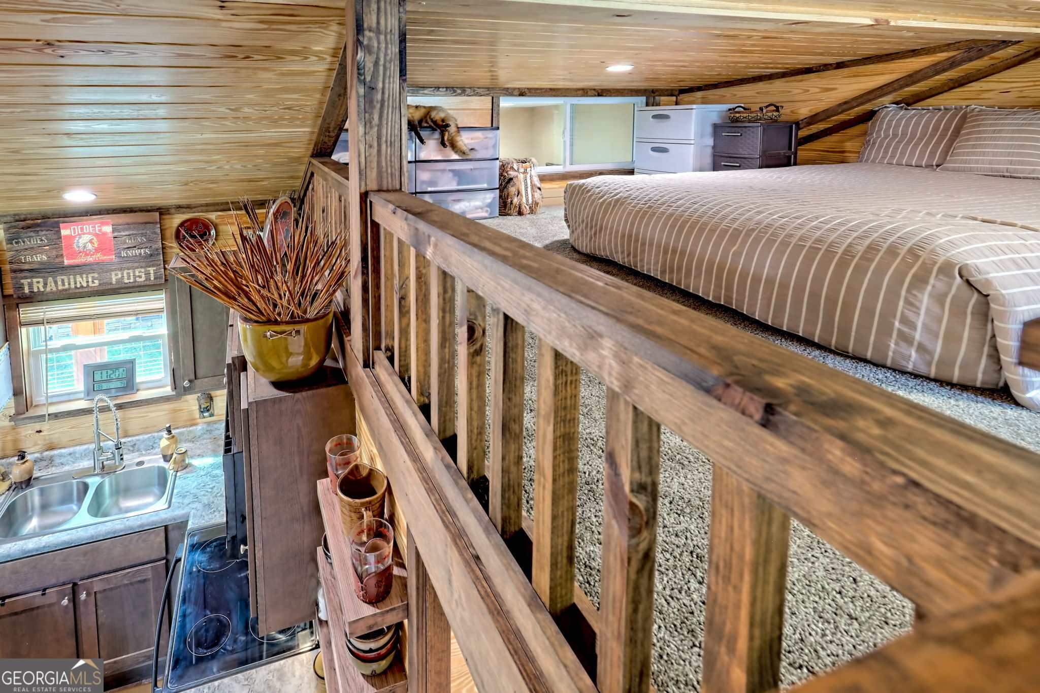 4960 Laurel Lodge Road, Unit 18 Clarkesville, GA 30523 - Photo 33 of 59 a bedroom with furniture and a window