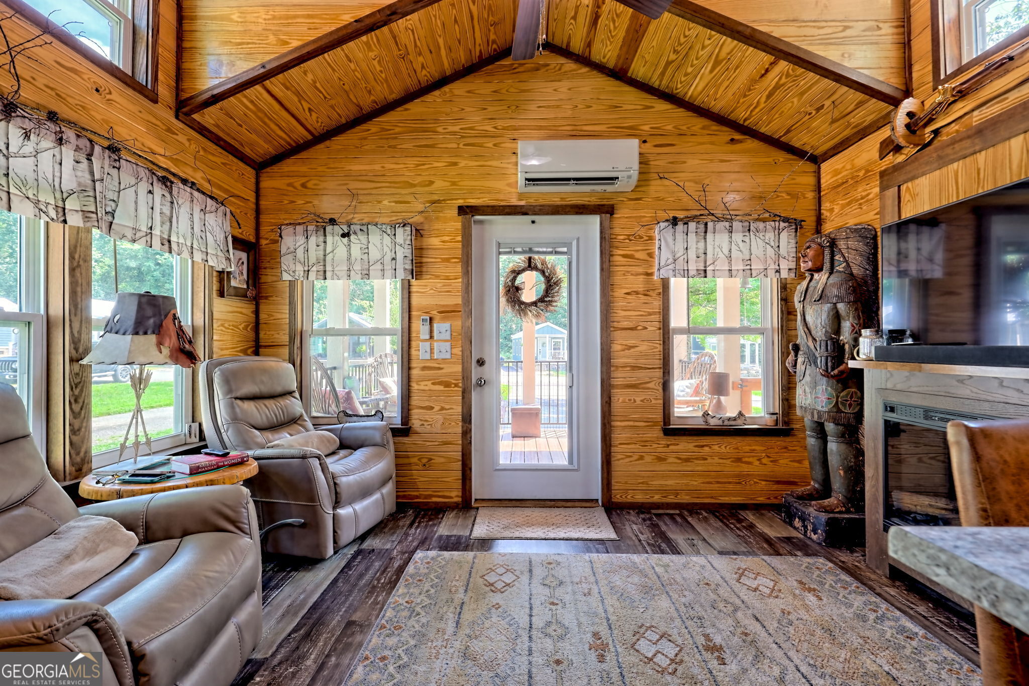 4960 Laurel Lodge Road, Unit 18 Clarkesville, GA 30523 - Photo 36 of 59 a bedroom with furniture and large windows