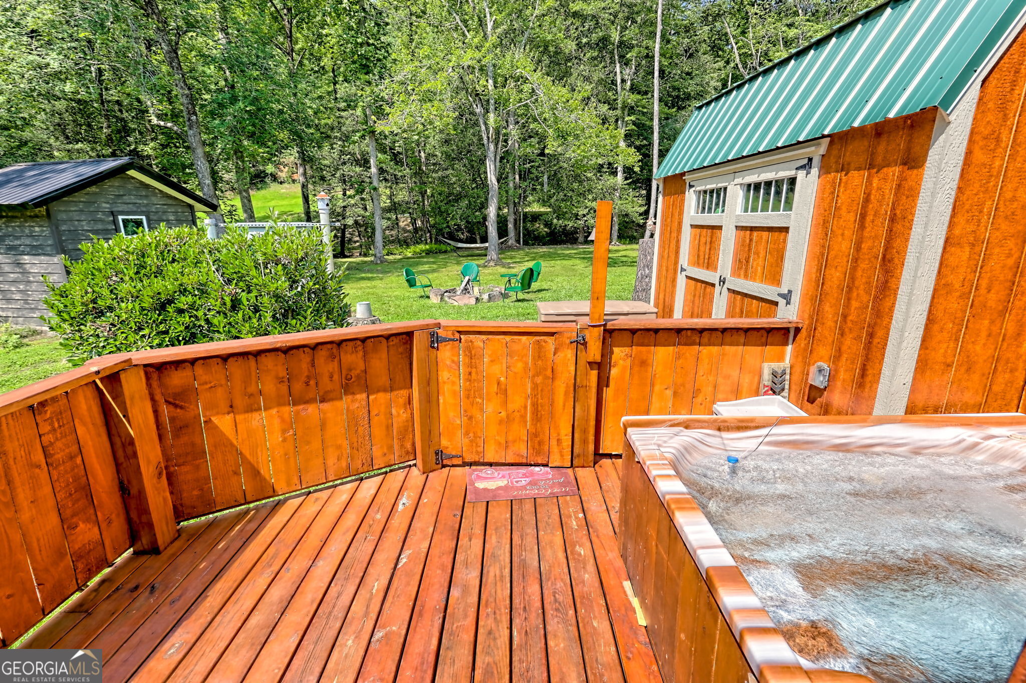 4960 Laurel Lodge Road, Unit 18 Clarkesville, GA 30523 - Photo 42 of 59 a view of outdoor space with wooden floor and yard