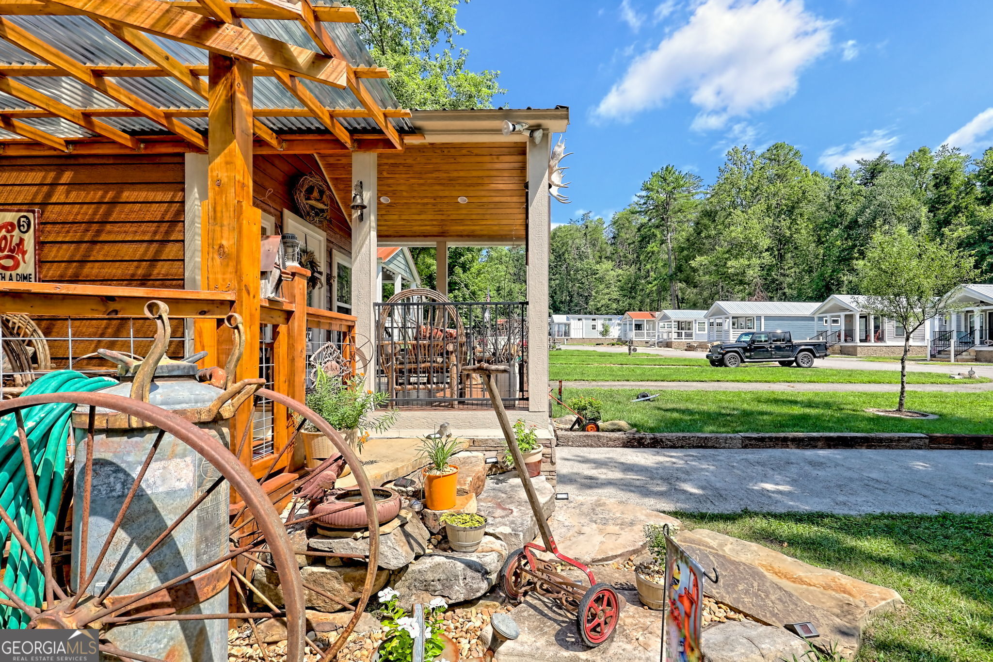 4960 Laurel Lodge Road, Unit 18 Clarkesville, GA 30523 - Photo 48 of 59 a backyard of a house with lots of green space