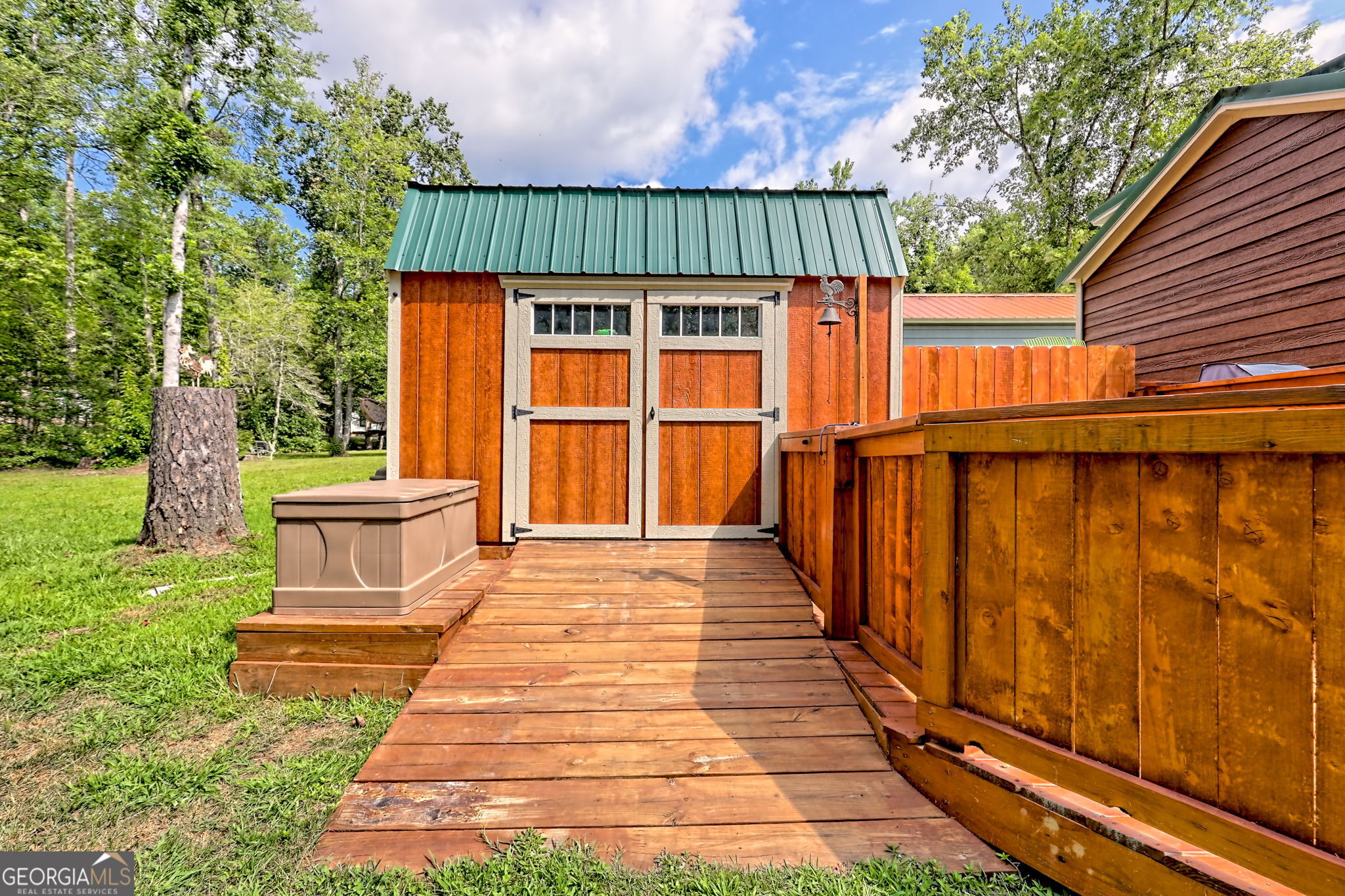 4960 Laurel Lodge Road, Unit 18 Clarkesville, GA 30523 - Photo 56 of 59 a front view of a house with a yard
