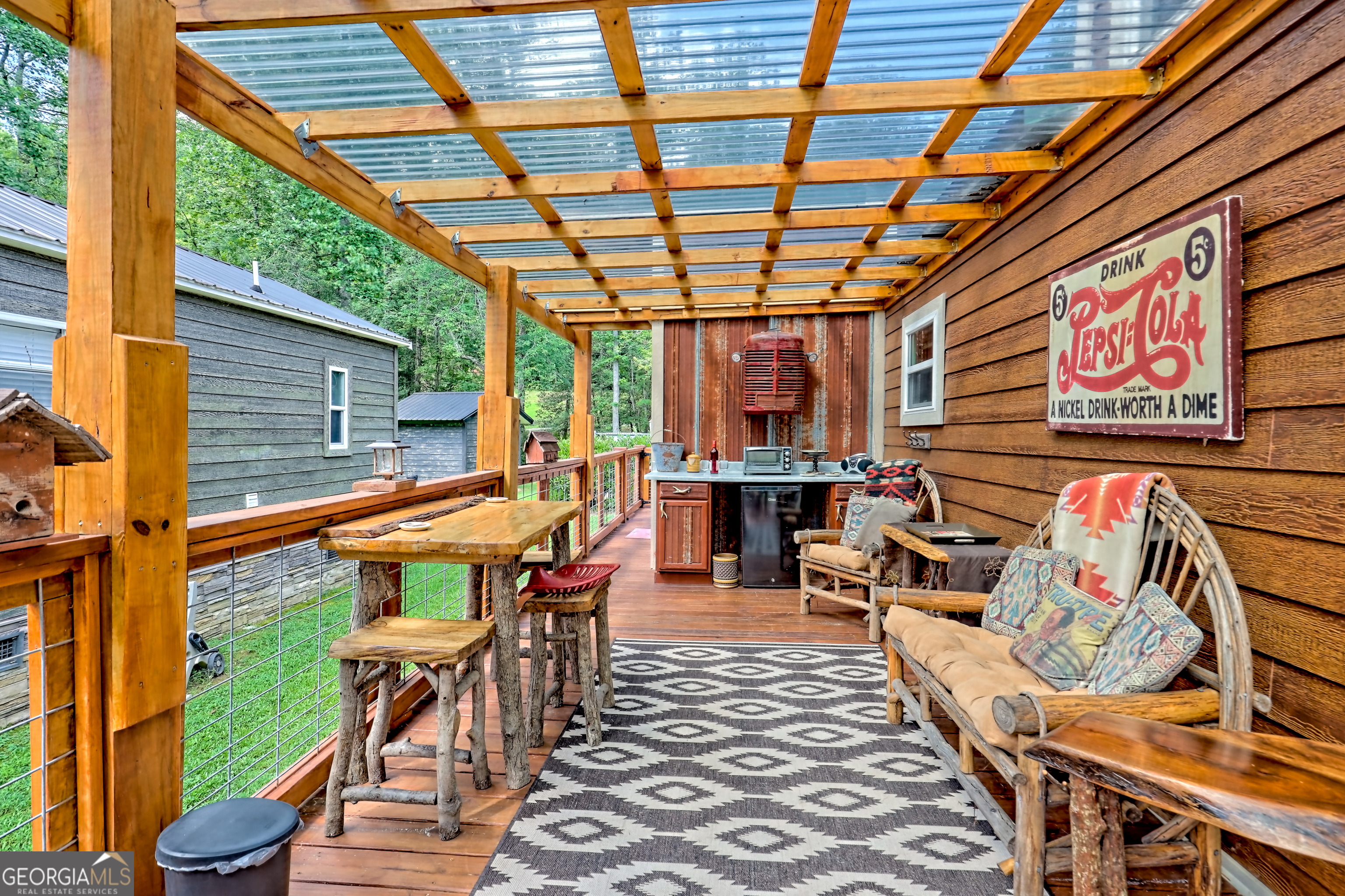 4960 Laurel Lodge Road, Unit 18 Clarkesville, GA 30523 - Photo 6 of 59 a outdoor space with sitting area