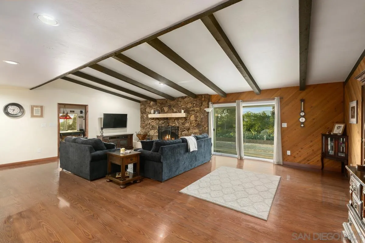 738 Lilac Ranch Road Alpine, CA 91901 - Photo 7 of 72 a living room with furniture and a flat screen tv