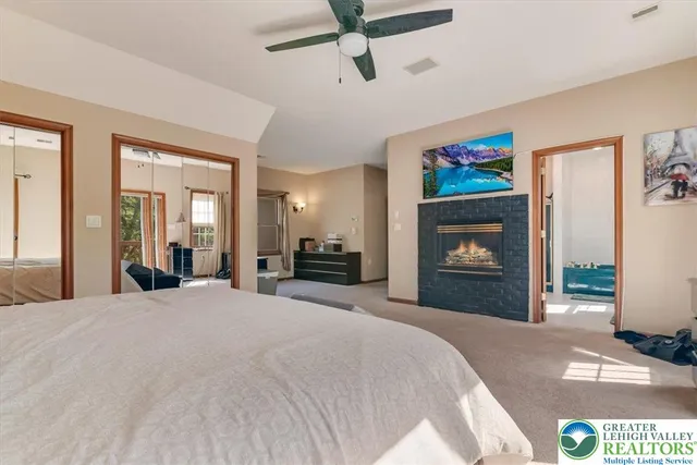 a view of room with furniture and windows