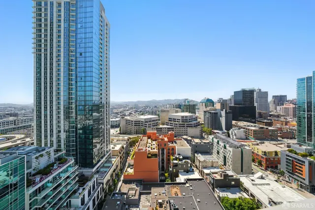 a view of a city with tall buildings