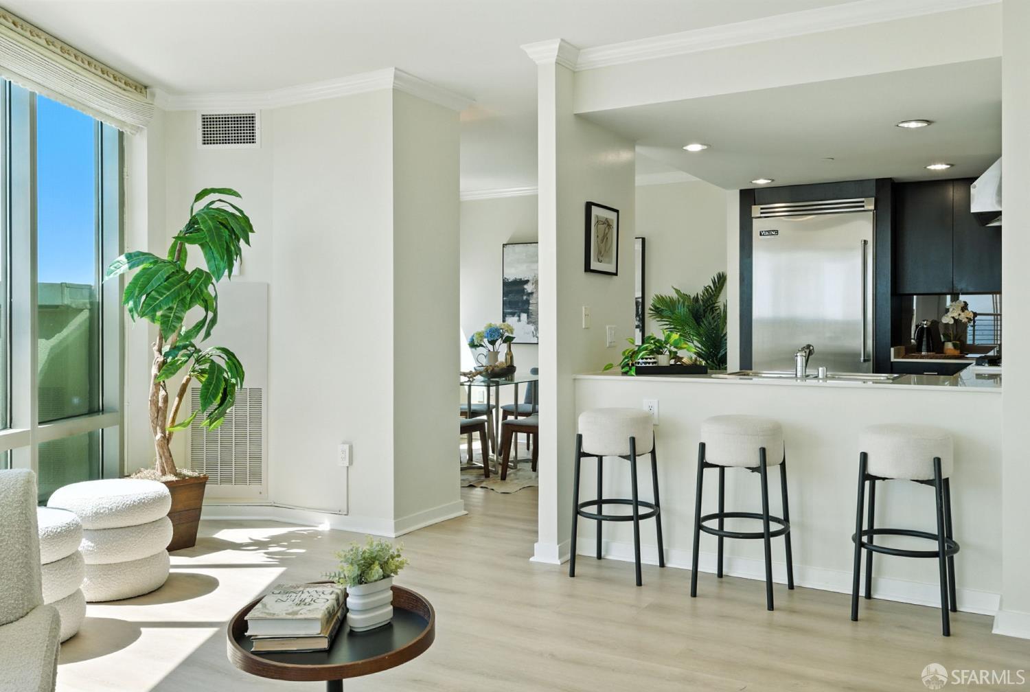 355 1st Street, Unit S2503 San Francisco, CA 94105 - Photo 18 of 67 a living room with furniture and a potted plant