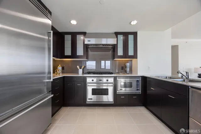 a view of staircase with a book shelf