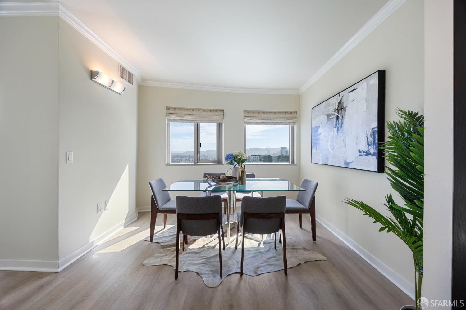 355 1st Street, Unit S2503 San Francisco, CA 94105 - Photo 21 of 67 a view of a dining room with furniture window and wooden floor