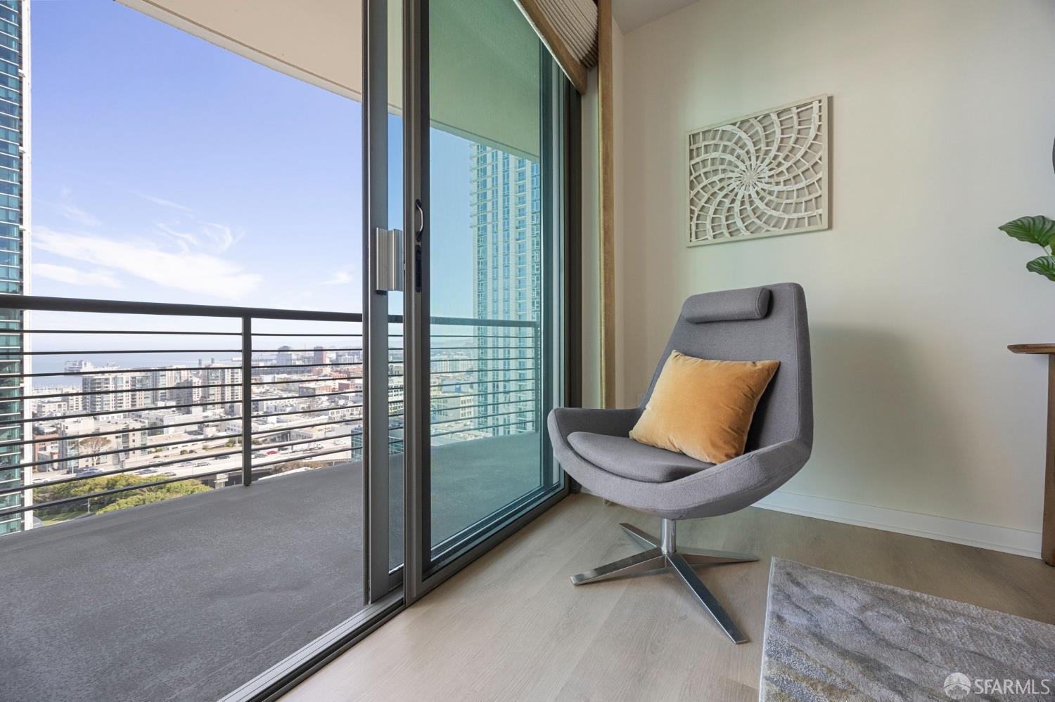 355 1st Street, Unit S2503 San Francisco, CA 94105 - Photo 27 of 67 a view of a hallway with couches and a rug floor