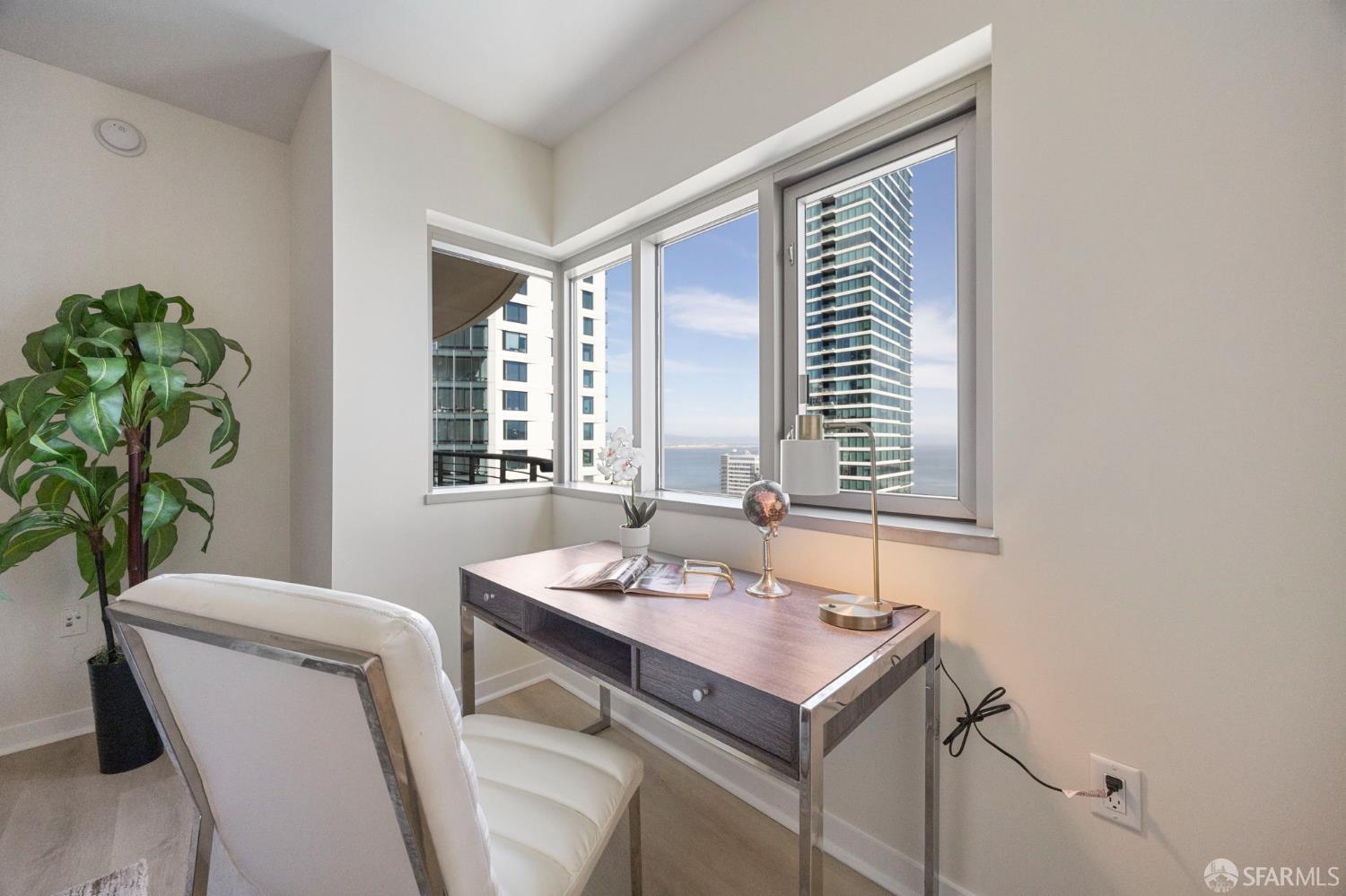 355 1st Street, Unit S2503 San Francisco, CA 94105 - Photo 31 of 67 a view of a room that has a couch and a table in it