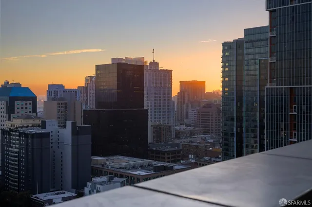 a view of a back yard of the house with a fountain