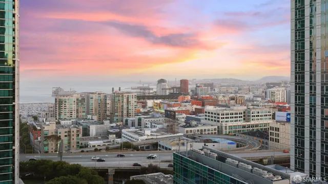 a view of a livingroom with furniture and a window