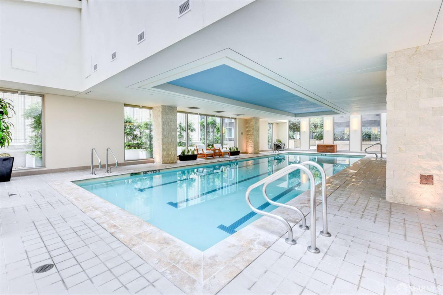 355 1st Street, Unit S2503 San Francisco, CA 94105 - Photo 49 of 67 a view of a kitchen with dining table and chairs