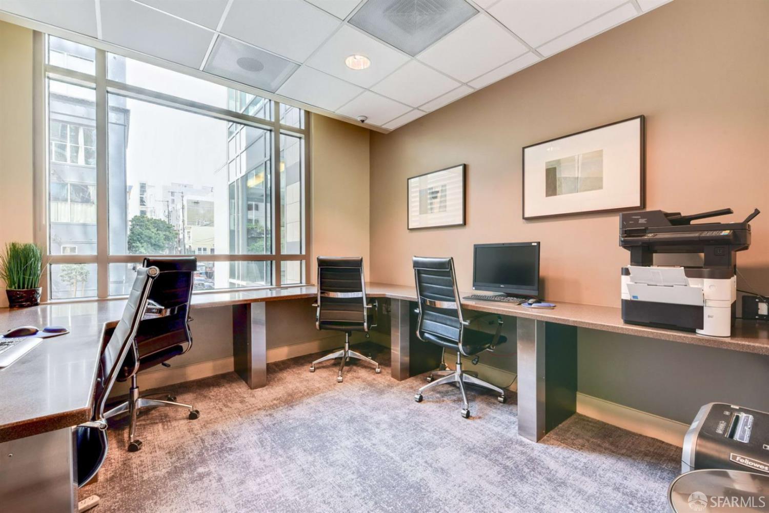 355 1st Street, Unit S2503 San Francisco, CA 94105 - Photo 57 of 67 a view of a workspace with furniture and a window