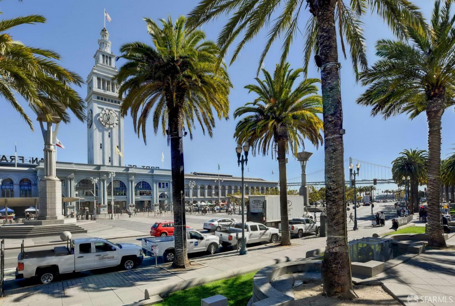 355 1st Street, Unit S2503 San Francisco, CA 94105 - Photo 66 of 67 a city street with cars and palm trees