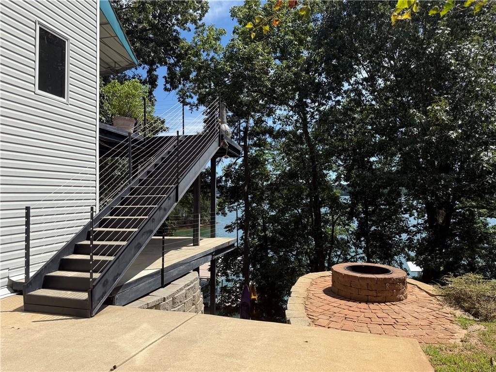 4265 Sinclair Shores Road Cumming, GA 30041 - Photo 12 of 18 a view of a back yard of the house