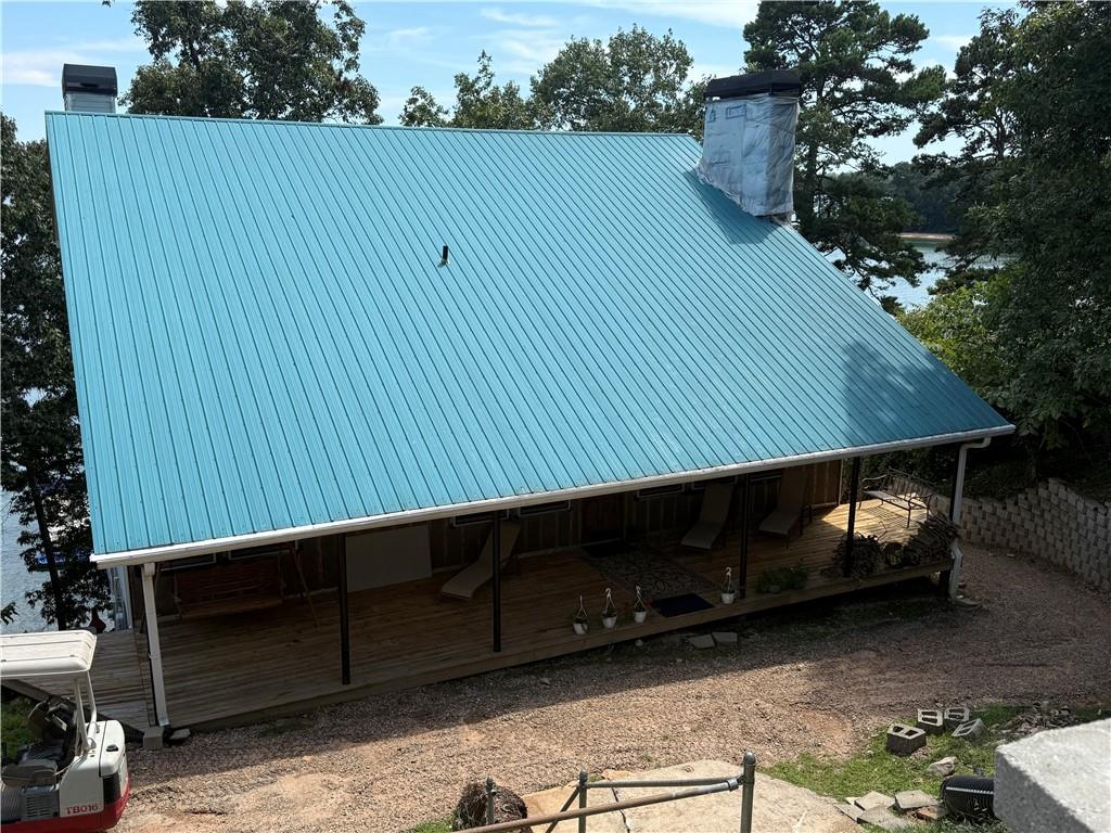 4265 Sinclair Shores Road Cumming, GA 30041 - Photo 13 of 18 a view of outdoor space and deck