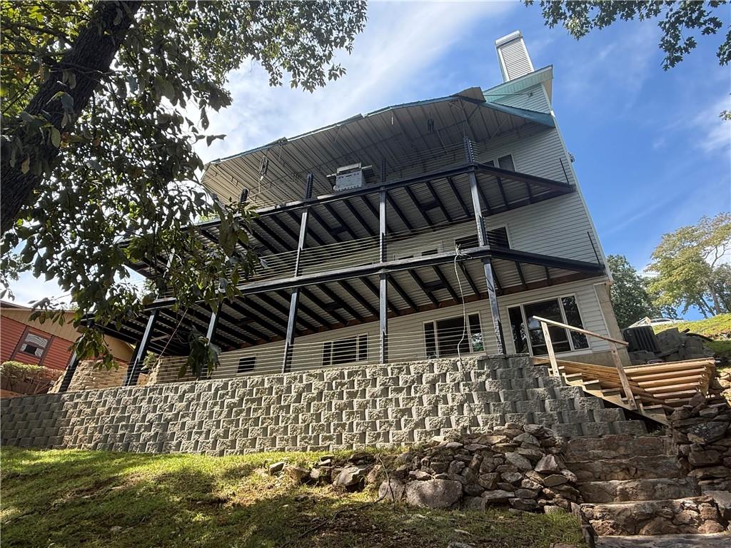 4265 Sinclair Shores Road Cumming, GA 30041 - Photo 3 of 18 a view of a large building