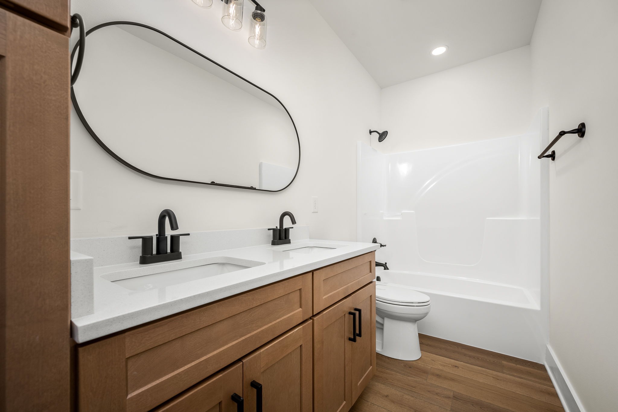 4151 Asbury Road Manchester, TN 37355 - Photo 26 of 32 a bathroom with a sink a toilet and a mirror