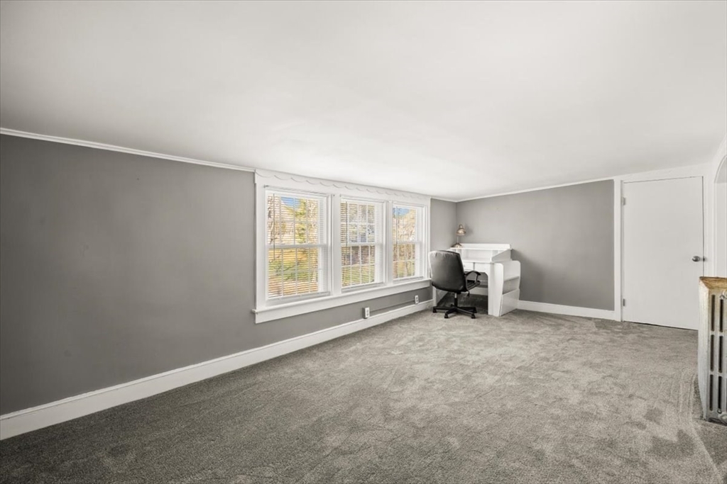 1 Elm Street, Unit 3 Freetown, MA 02702 - Photo 12 of 16 a view of a livingroom with furniture and a window