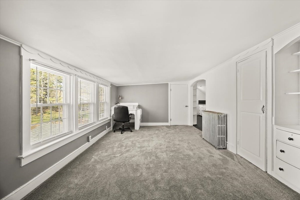 1 Elm Street, Unit 3 Freetown, MA 02702 - Photo 13 of 16 a view of a livingroom with an empty space and a window