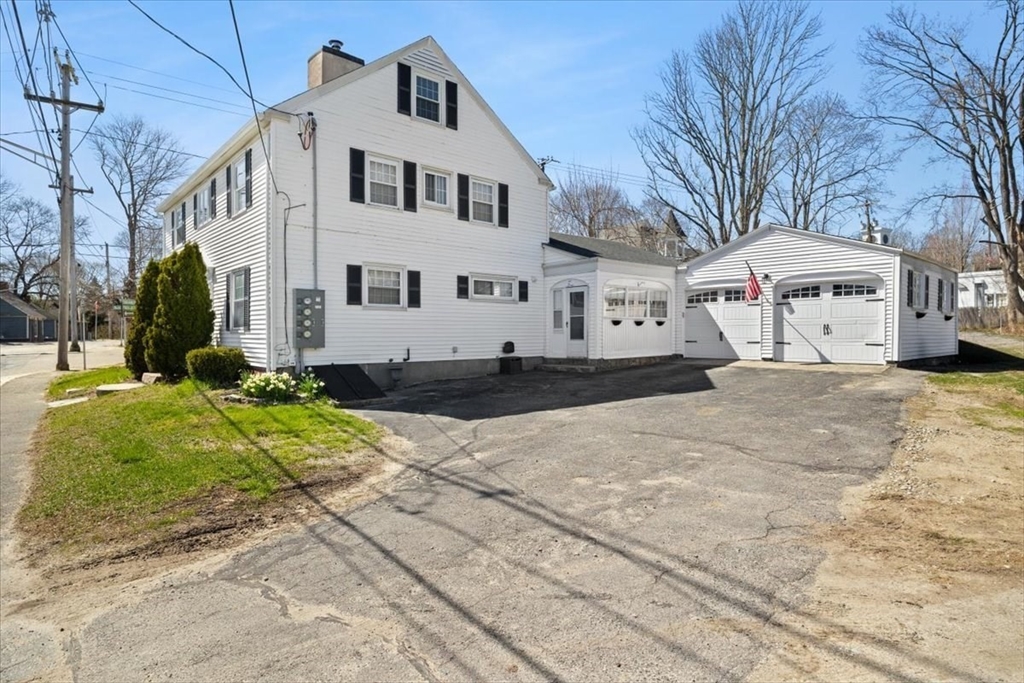 1 Elm Street, Unit 3 Freetown, MA 02702 - Photo 3 of 16 a white house that has a tree on the side of it