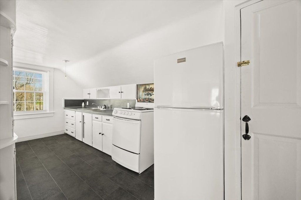 1 Elm Street, Unit 3 Freetown, MA 02702 - Photo 7 of 16 a kitchen with appliances a sink and dishwasher
