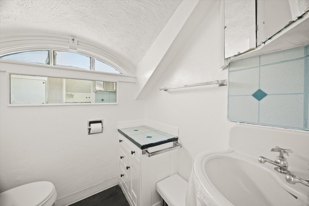 1 Elm Street, Unit 3 Freetown, MA 02702 - Photo 8 of 16 a bathroom with a sink toilet and shower