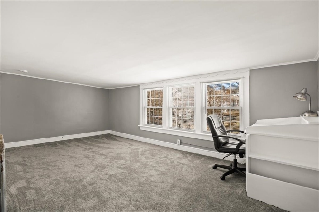 1 Elm Street, Unit 3 Freetown, MA 02702 - Photo 10 of 16 a view of a workspace with furniture and a window