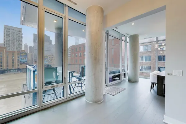 a room with lots of table and chairs