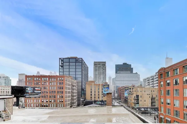 a view of a city with tall buildings