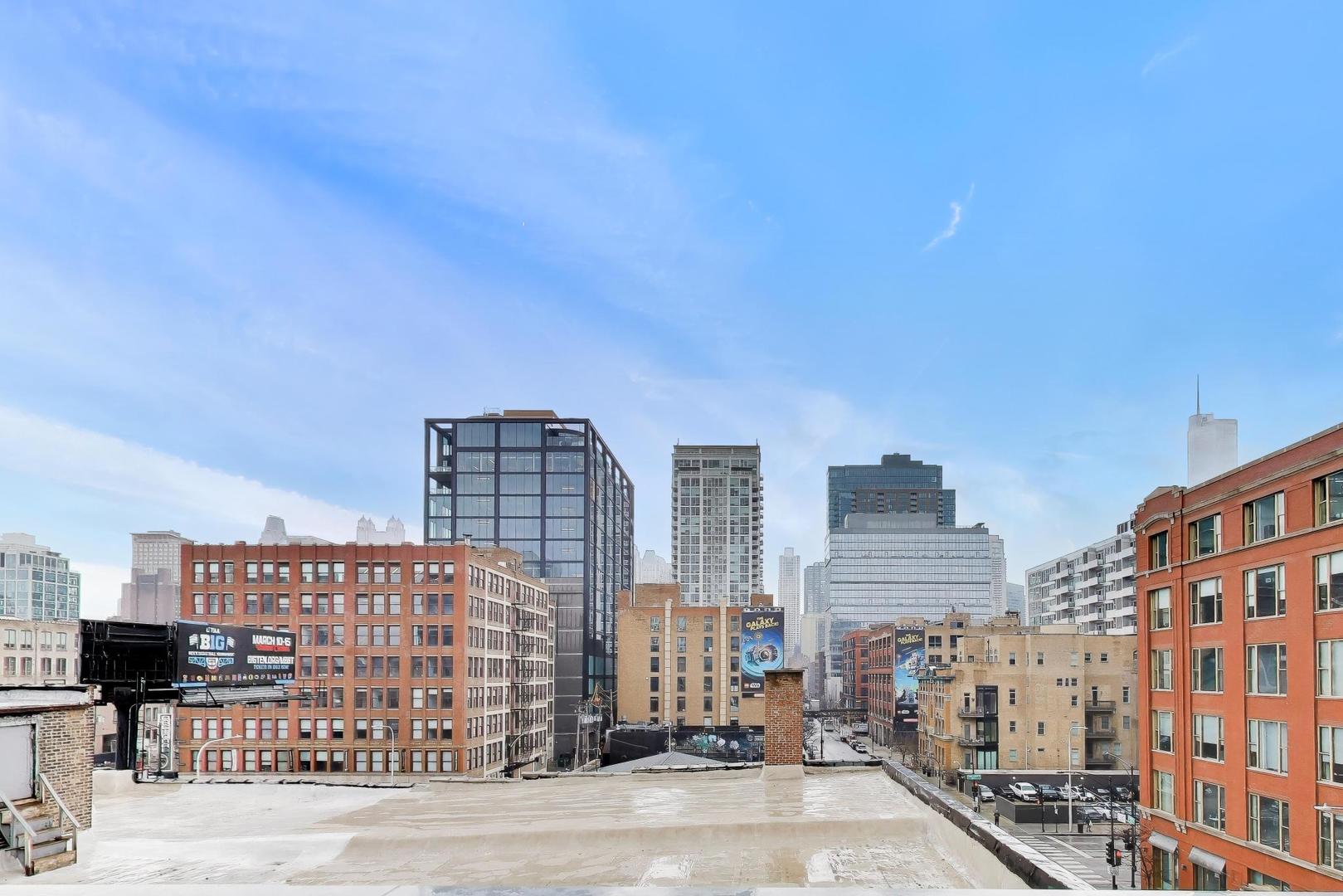 360 West Erie Street, Unit 5D Chicago, IL 60654 - Photo 14 of 41 a view of a city with tall buildings