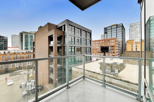 a balcony view with a flat screen tv