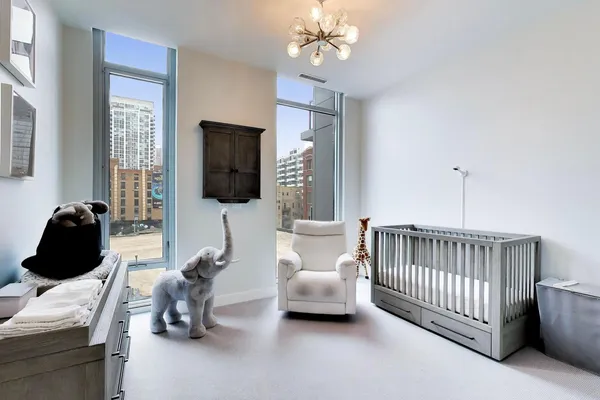 a bedroom with furniture and a window