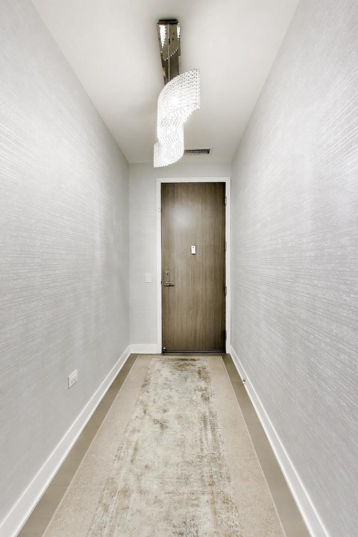 360 West Erie Street, Unit 5D Chicago, IL 60654 - Photo 32 of 41 wooden floor in a room