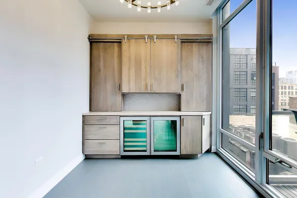 a room with a bed and a window