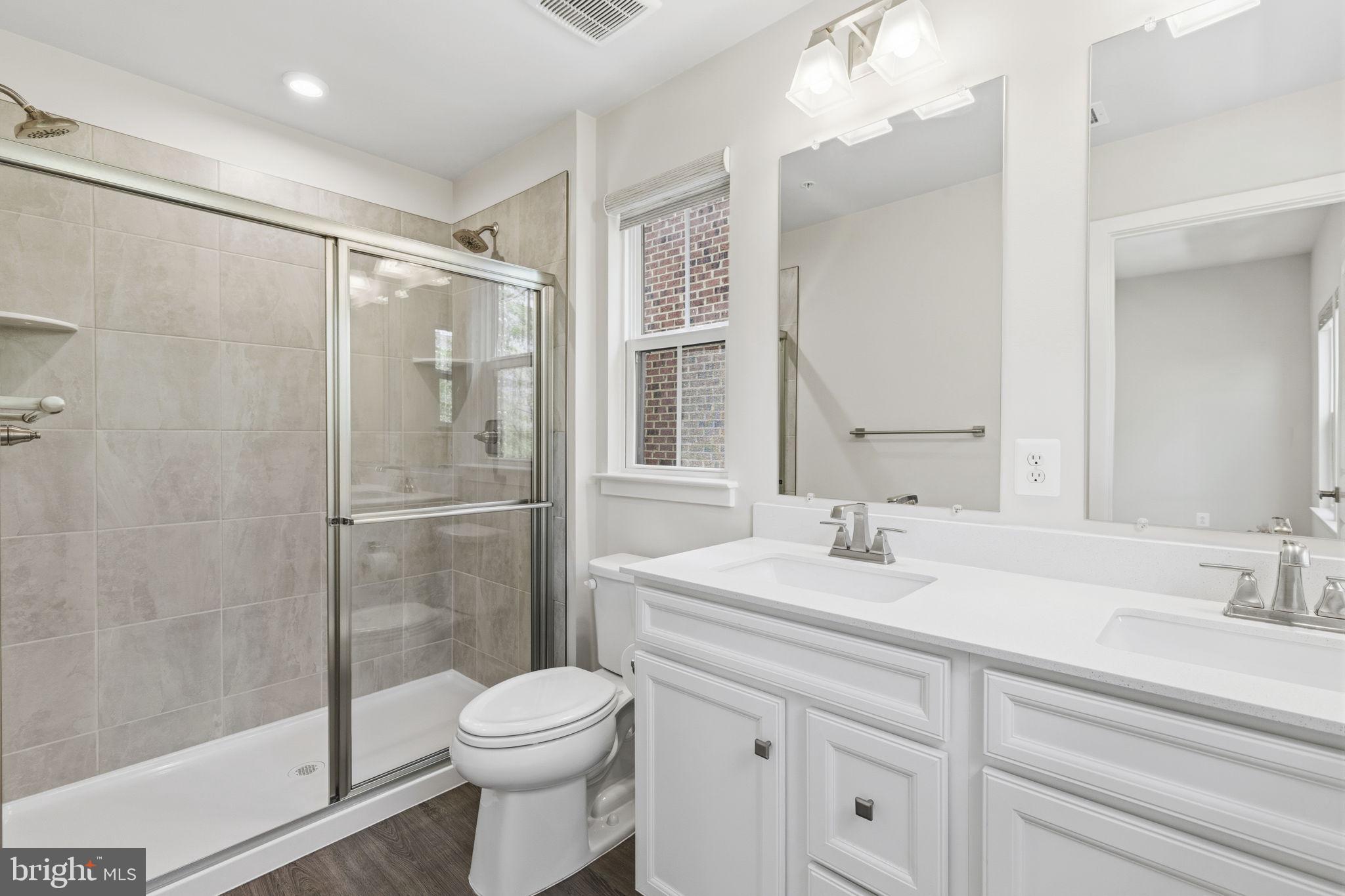 1566 Lowman Street Baltimore, MD 21230 - Photo 22 of 47 a bathroom with a sink toilet and shower