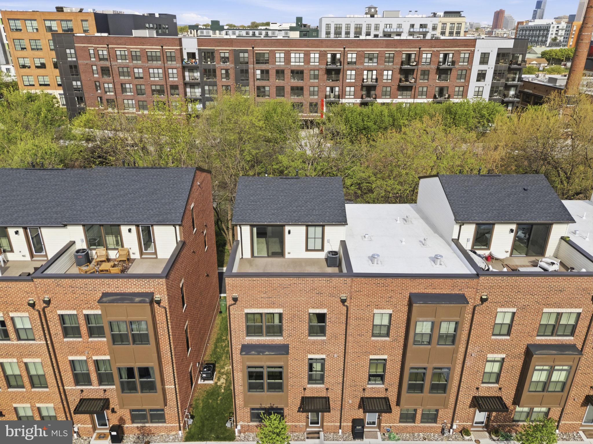 1566 Lowman Street Baltimore, MD 21230 - Photo 39 of 47 a aerial view of a brick building next to a yard