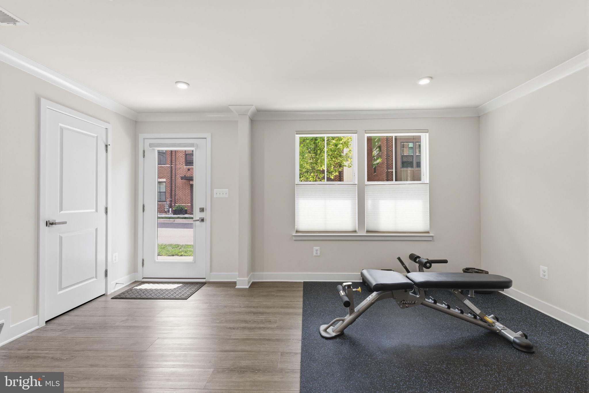 1566 Lowman Street Baltimore, MD 21230 - Photo 6 of 47 a room with gym equipment and a window